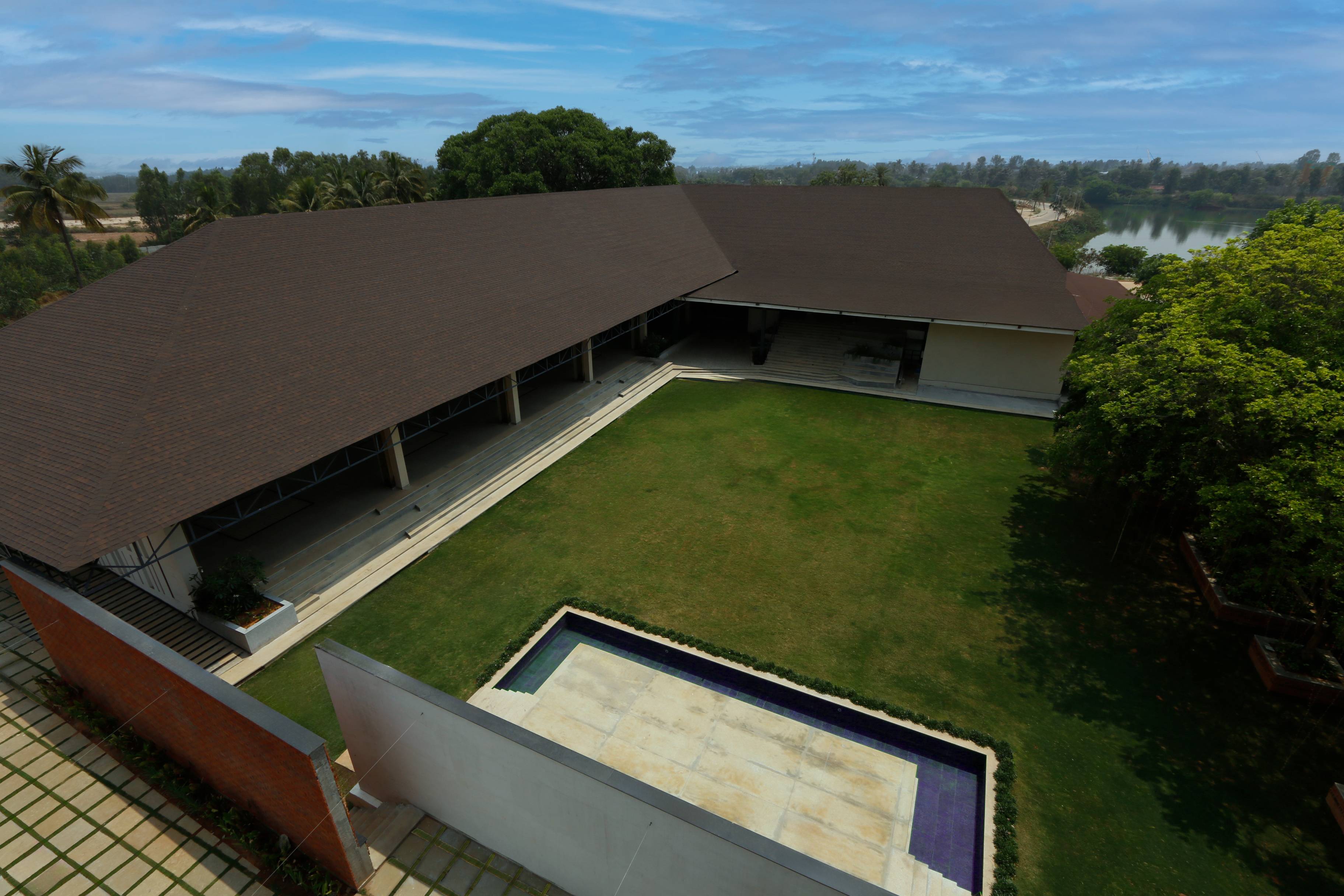 Padma Pavilion and Padma Lawns, with trees and Chagaletty Lake beyond