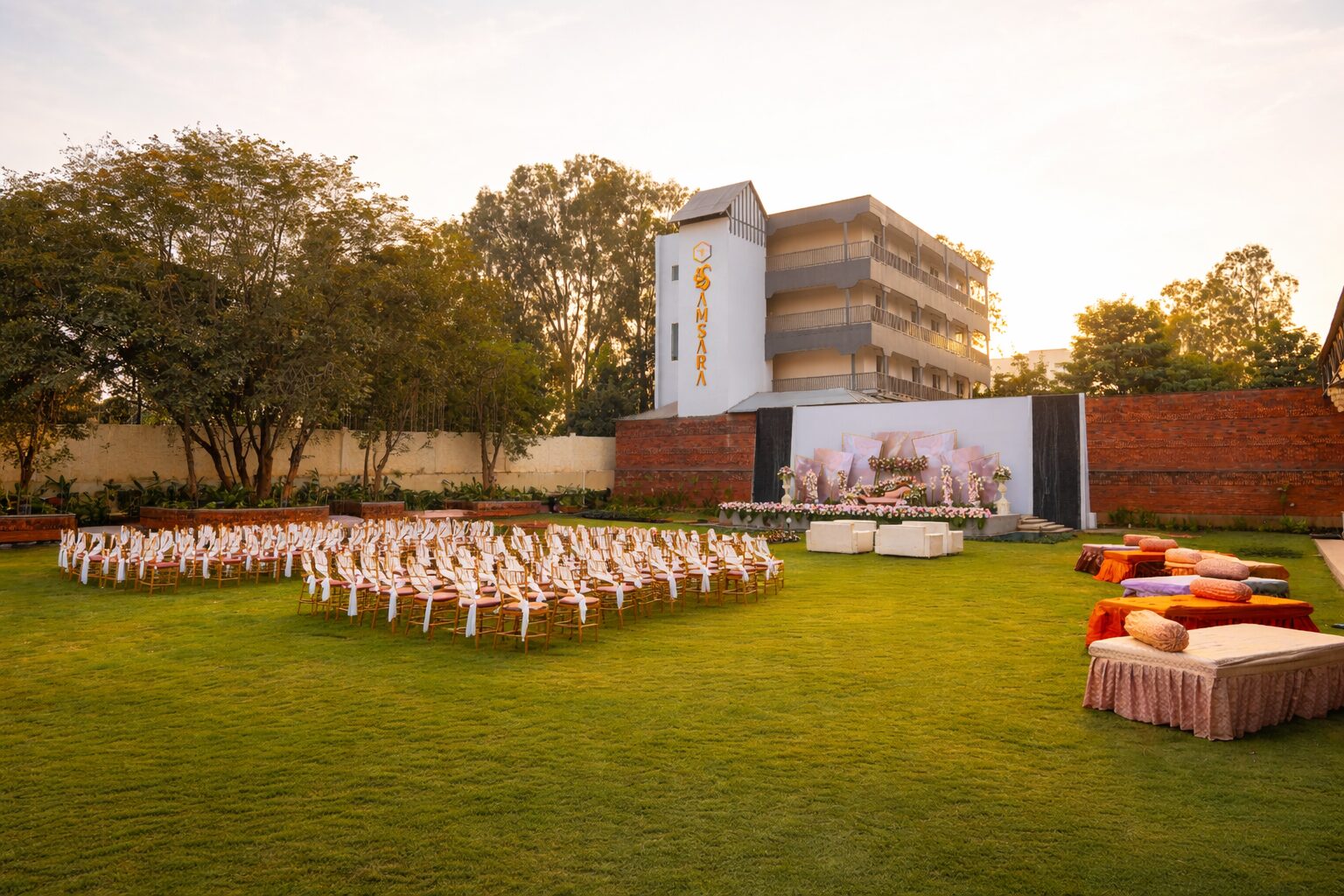 Padma Lawns with ceremony seating and an event backdrop