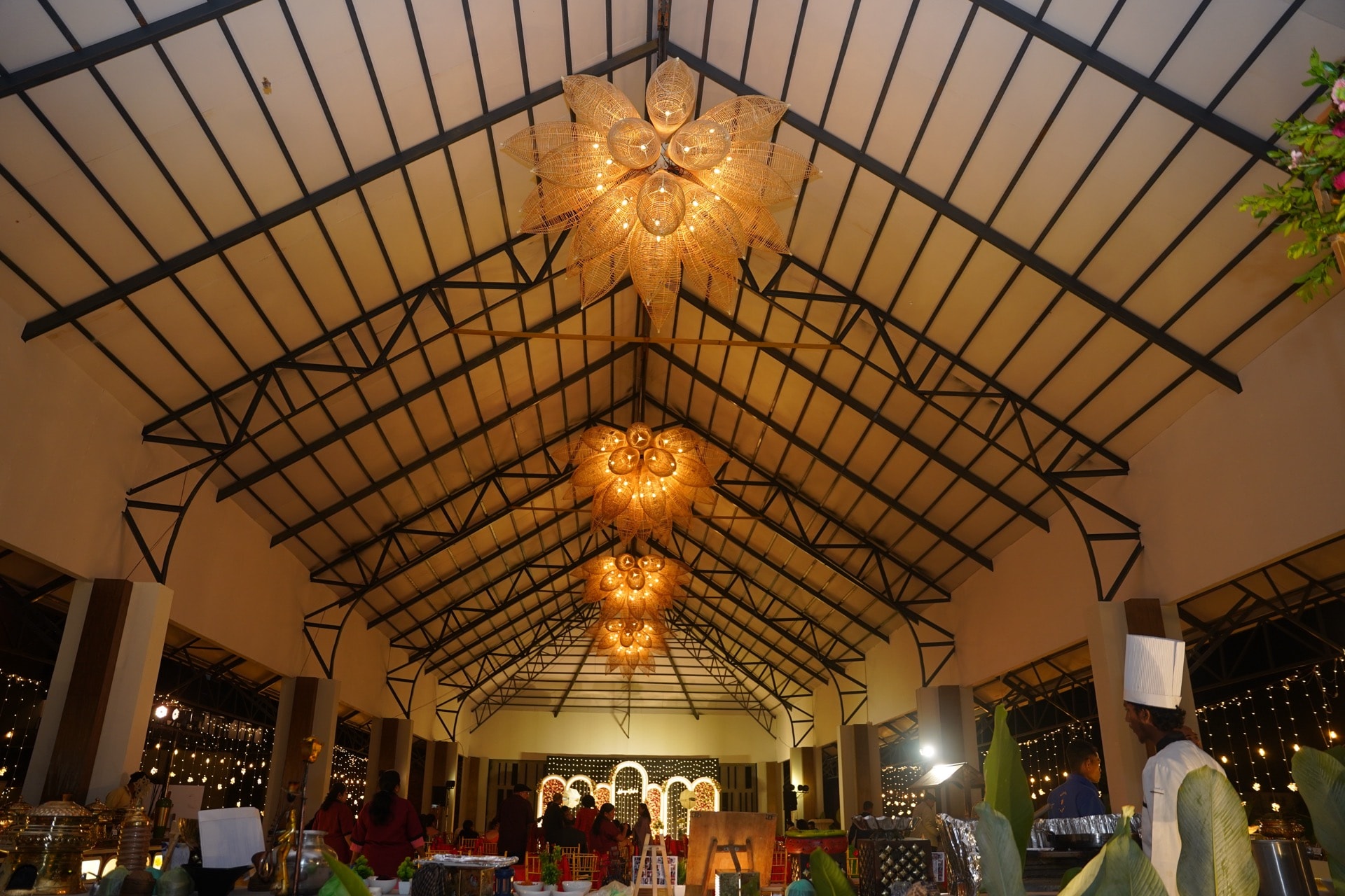 Padma Pavilion — vaulted ceiling with lotus chandeliers from below
