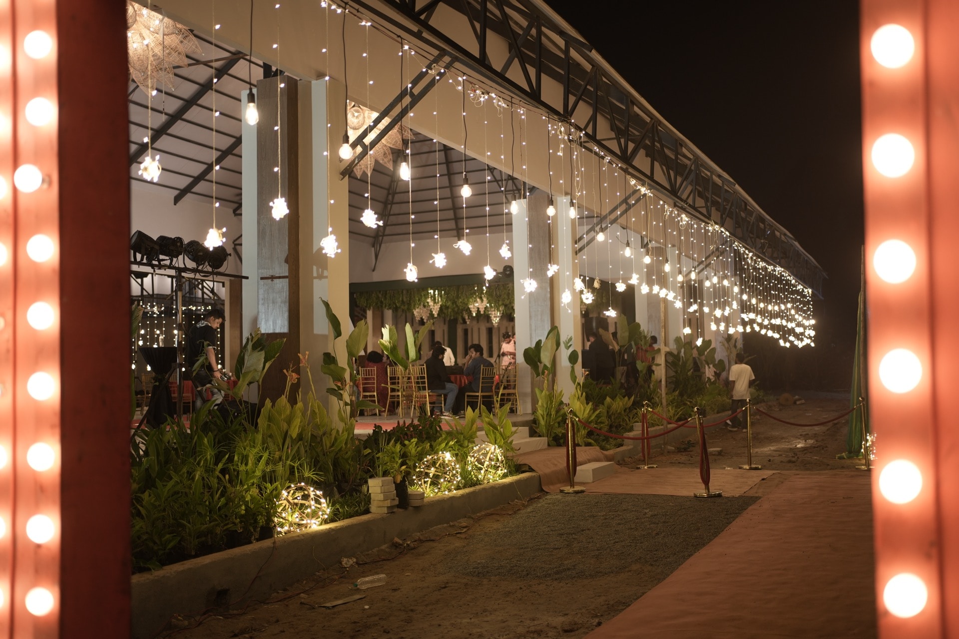 Padma Pavilion — exterior at night with fairy lights