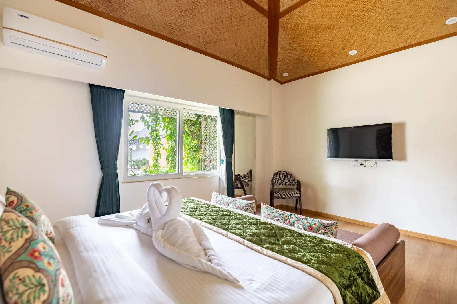 Rumah Residence with warm woven-ceiling interiors