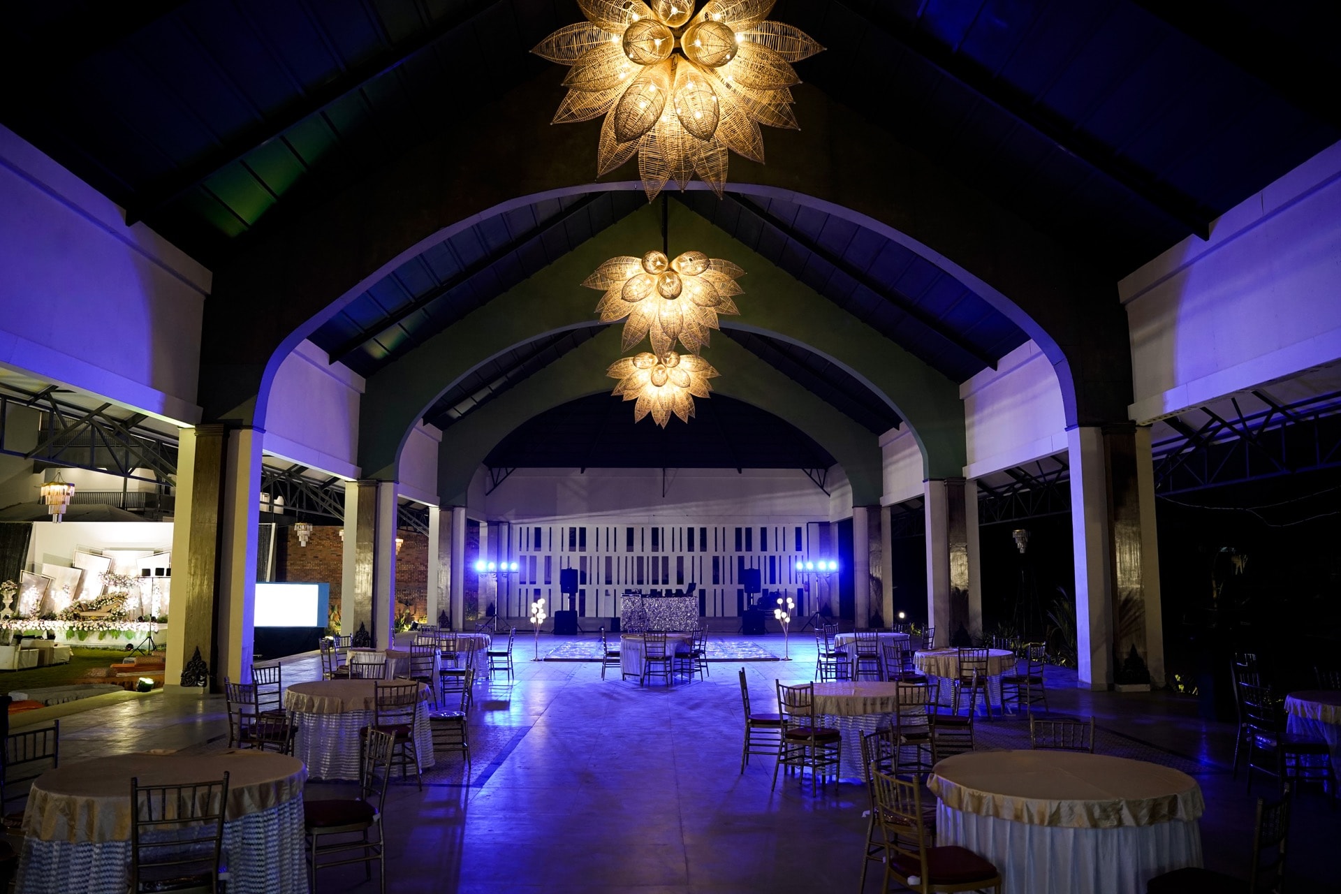 The pavilion illuminated for an evening event